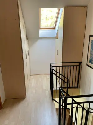 a hallway with stairs and a window in a building at 069 Riverside Vikendica - Banja Luka in Rekavice