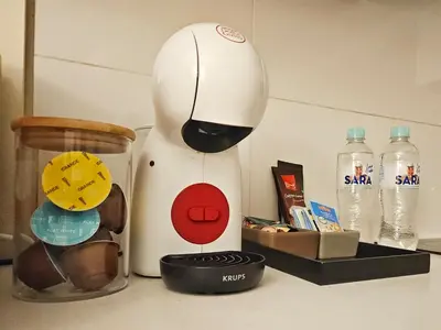 a chef figurine sitting on top of a counter at Bell Apartment in Bihać