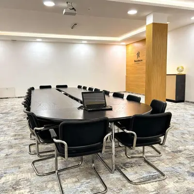 a conference room with a table with a laptop on it at Hotel Residence Travnik in Travnik