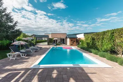 a swimming pool in the backyard of a house at Delta apartments in Bihać