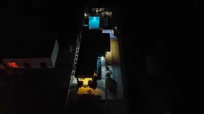 an overhead view of a street at night at Delta apartments in Bihać