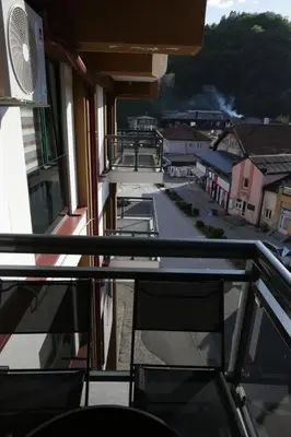 a balcony with a view of a street at Apartman Hana Fojnica in Fojnica