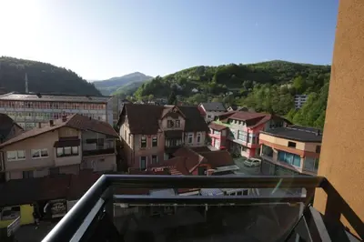 a view from a balcony of a town with houses at Apartman Hana Fojnica in Fojnica