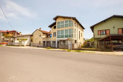 a row of houses on the side of a street at Guest House Fiona in Bihać