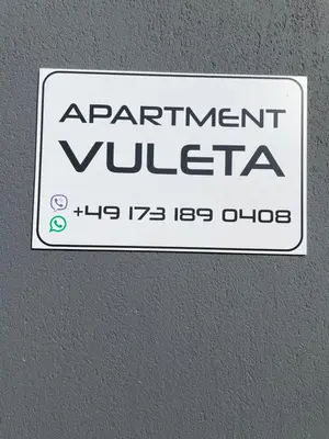 a sign on a wall that reads apartment vuelita at Apartment Vuleta Deluxe Extra groß in Prijedor