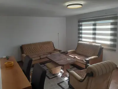a living room with two couches and a table at Hasan's apartment - holiday house - vikendica - kuća za odmor - apartman in Visoko