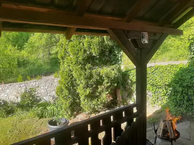 a view of a garden from a porch at Hasan's apartment - holiday house - vikendica - kuća za odmor - apartman in Visoko