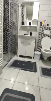 a bathroom with a sink and a toilet at Apartman Aurora in Travnik