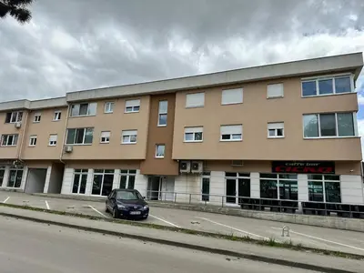 a car parked in front of a building at Studio Apartman Centar 2 in Livno