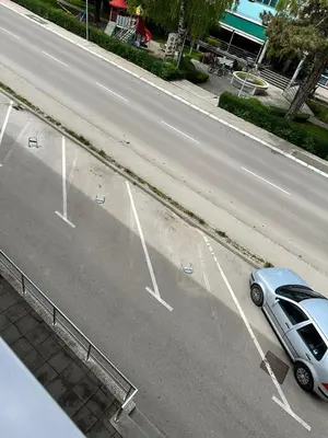 a car parked on the side of a road at Studio Apartman Centar 2 in Livno