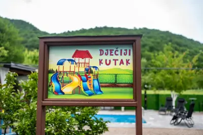a sign for a playground with a slide at Kuća za odmor Dani in Bihać