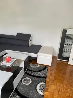 a living room with a couch and a coffee table at Vista Castle in Jajce