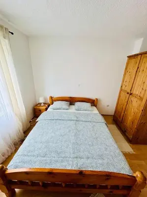 a bedroom with two beds in a room at Apartman Latice in Tomislavgrad
