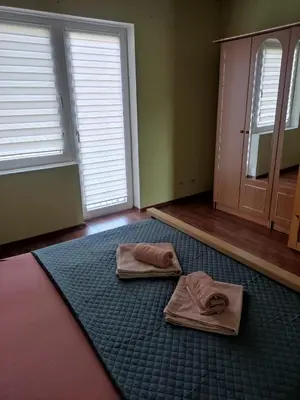 a room with two towels sitting on the floor at Guesthouse Nestoria Living in Banja Luka