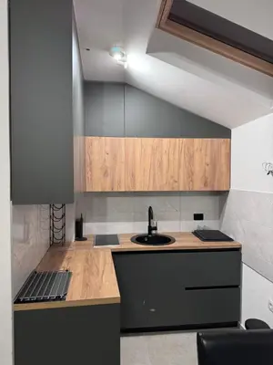 a kitchen with a sink and a counter at City centar Travnik-free parking in Travnik