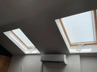 two skylights in the ceiling of a kitchen at City centar Travnik-free parking in Travnik