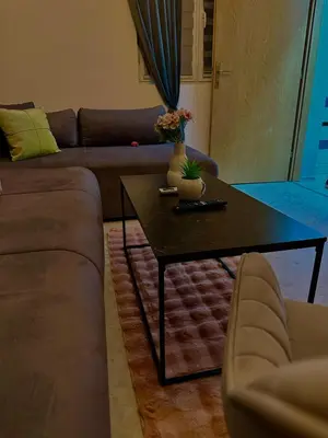 a living room with a couch and a coffee table at Apartman Fin in Jajce