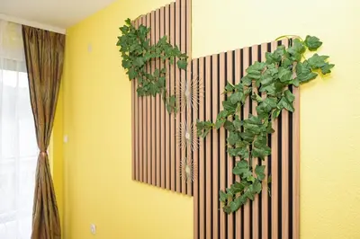 a ivy on the wall of a room at Palma in Jajce