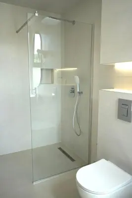 a bathroom with a glass shower with a toilet at CASA V BENCUN Deluxe Queen Rooms in Kiseljak