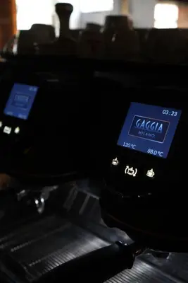 a close up of two signs on a machine at CASA V BENCUN Deluxe Queen Rooms in Kiseljak