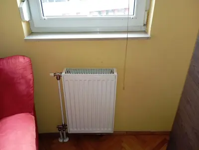 a room with a radiator and a window at Kiki in Banja Luka