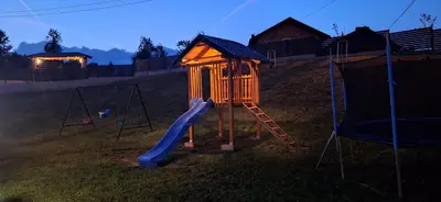 a playground with a slide and a play structure at Suncev Brijeg in Banja Luka