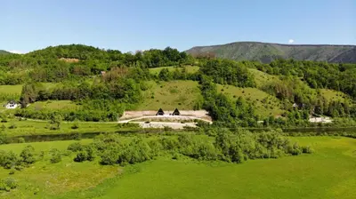 an aerial view of a house on a hill at Bungalov Mila in Šipovo