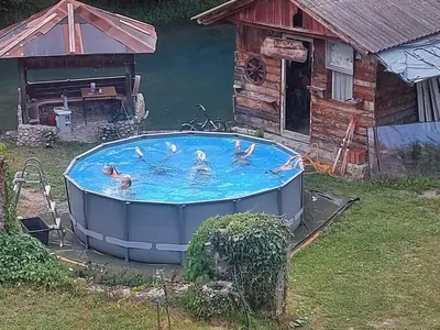 a group of ducks swimming in a hot tub at Villa Janj in Šipovo