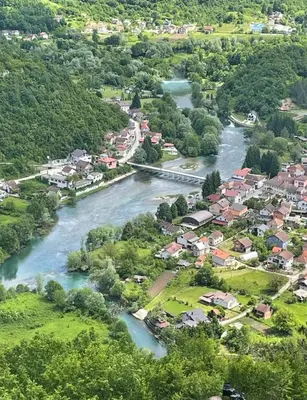 an aerial view of a town next to a river at Apartman EMA in Kulen Vakuf