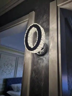a wreath hanging on the door of a room at Apartman Spa kristal in Banja Luka