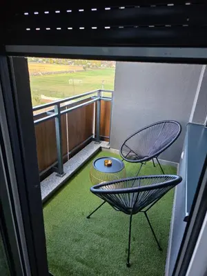 a view of a balcony with a table and chairs at Apartman Spa kristal in Banja Luka
