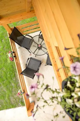an overhead view of a patio with chairs and a table at Cottage NIKA in Jajce