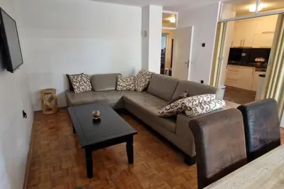 a living room with a couch and a table at Apartman Nataša BL 2 in Banja Luka
