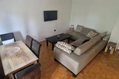 a living room with a couch and a table at Apartman Nataša BL 2 in Banja Luka