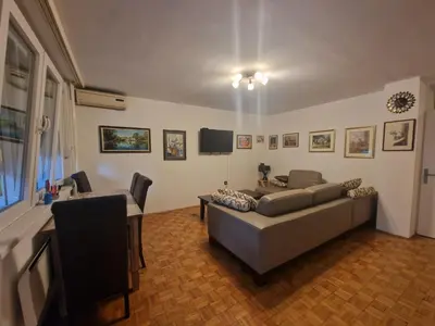 a living room with a couch and a table at Apartman Nataša BL 2 in Banja Luka