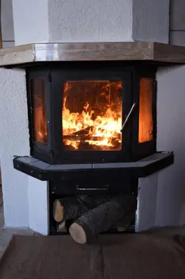 a brick oven with a fire inside of it at Brano in Kupres