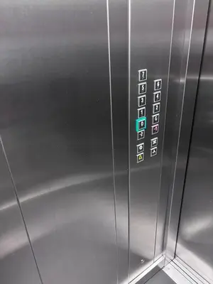 a close up of an elevator with the control buttons at Central Luxe in Banja Luka