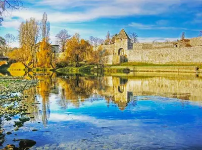 a view of the lake in front of a castle at Stan na dan Santo in Banja Luka