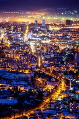 a view of a city at night with lights at Stan na dan Santo in Banja Luka