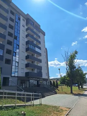a building with stairs in front of a building at Urban Studio Apartment in Tuzla