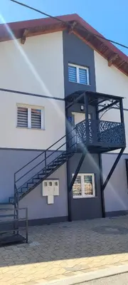 a staircase on the side of a building at Oz Lux Apartments in Bihać