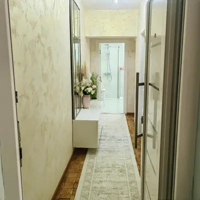 a bathroom with a mirror and a walk in shower at Lux Apartman Novi Grad in Bosanski Novi