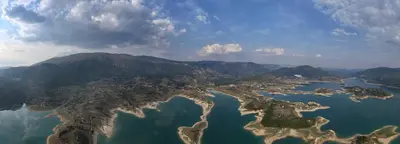 an aerial view of a city and a body of water at Apartmani Venecia in Prozor