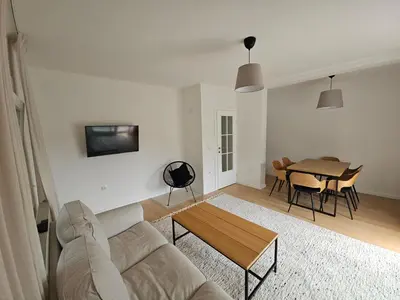 a living room with a couch and a table at Apartment DANICA in Banja Luka