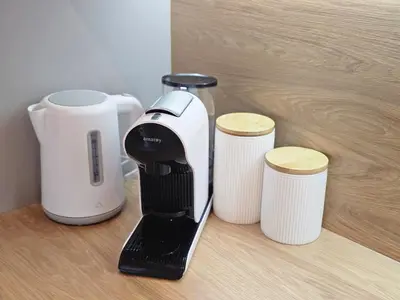 a black and white blender sitting on a counter at Apartment DANICA in Banja Luka