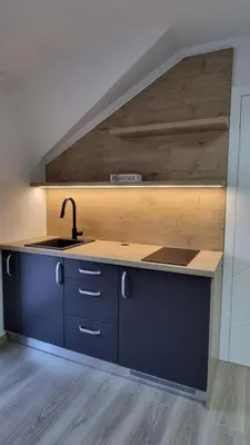 a kitchen with a sink and a counter top at Apartmаn Avram ll in Kotor-Varoš