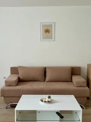 a living room with a couch and a coffee table at Jelena in Jajce