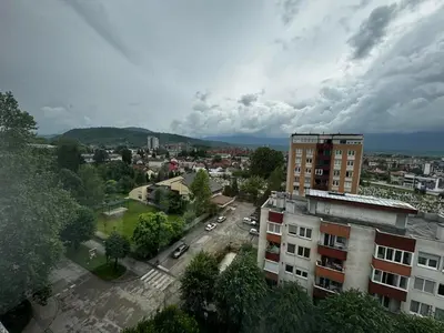 an aerial view of a city with buildings and cars at Asya Art in Bihać