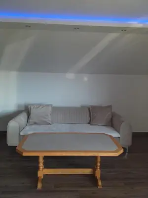 a living room with a couch and a table at Ivan in Livno