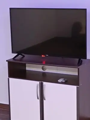 a flat screen tv sitting on top of a tv stand at Ivan in Livno